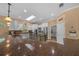 Open kitchen featuring a center island, stainless steel appliances, ample counter space, and modern lighting at 2272 Se Laurel Run Dr, Ocala, FL 34471