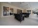 Enjoy the spacious screened-in patio with bar and sitting area with access to the pool at 2272 Se Laurel Run Dr, Ocala, FL 34471