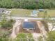 Aerial view of property showcasing house, large lot, and surrounding neighborhood at 23131 Sw Rainelle Rd, Dunnellon, FL 34431