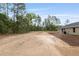 Expansive backyard view showing the lot size and privacy of the property at 23131 Sw Rainelle Rd, Dunnellon, FL 34431