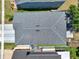 Aerial view showcases the roof of a home, highlighting its architectural design and condition at 2525 Sand Arbor Cir, Orlando, FL 32824