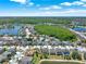 A residential community with mature trees, scenic lakes, and well-maintained streets at 2525 Sand Arbor Cir, Orlando, FL 32824
