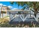 View of the home's backyard and deck area, perfect for outdoor seating at 2525 Sand Arbor Cir, Orlando, FL 32824