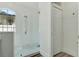 Bright bathroom featuring a glass-enclosed shower, a closet, and a window for natural light at 2525 Sand Arbor Cir, Orlando, FL 32824