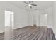 Spacious bedroom showcasing wood floors, an entryway, and a closet, creating a comfortable layout at 2525 Sand Arbor Cir, Orlando, FL 32824