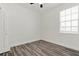 Bedroom showcases a large window providing natural light and a view of the outside at 2525 Sand Arbor Cir, Orlando, FL 32824