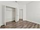 Walk-in closet boasts an open door, allowing easy access to clothing and accessories at 2525 Sand Arbor Cir, Orlando, FL 32824