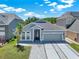 Beautiful single-story home with a well-manicured lawn and inviting curb appeal at 2525 Sand Arbor Cir, Orlando, FL 32824