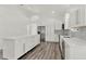 Bright kitchen with white cabinets, stainless steel appliances, and large island perfect for cooking at 2525 Sand Arbor Cir, Orlando, FL 32824