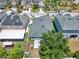 Aerial view of backyard featuring a paver patio, small storage, and partial fencing at 2525 Sand Arbor Cir, Orlando, FL 32824