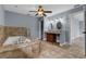 Light-filled bathroom showcasing a jacuzzi tub, double sink vanity and tile flooring at 260 Country Circle W Dr, Port Orange, FL 32128