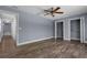 Open and airy bedroom with hardwood floors, natural light and closet at 260 Country Circle W Dr, Port Orange, FL 32128