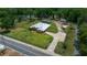 Expansive lot with fenced yard, screened pool, and detached garage provides a private retreat at 3934 Se 110Th St, Belleview, FL 34420