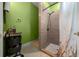 Bathroom shower featuring modern fixtures and tiled flooring at 3934 Se 110Th St, Belleview, FL 34420