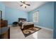 Tranquil bedroom with ceiling fan and neutral decor at 3934 Se 110Th St, Belleview, FL 34420