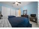 Bedroom with two queen beds, neutral tile floors and an ensuite bathroom at 3934 Se 110Th St, Belleview, FL 34420