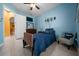 Bright bedroom with television and neutral tile floors at 3934 Se 110Th St, Belleview, FL 34420