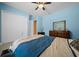 Comfortable bedroom with spacious closet and en-suite bathroom at 3934 Se 110Th St, Belleview, FL 34420