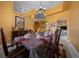 Cozy dining space with an inviting table setting and decorative details at 3934 Se 110Th St, Belleview, FL 34420