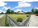 Beautiful single-story home on a large lot with mature trees, manicured lawn and gated entrance at 3934 Se 110Th St, Belleview, FL 34420