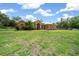 Spacious front yard, beautiful landscaping and a grand entrance at 3934 Se 110Th St, Belleview, FL 34420