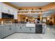Updated kitchen with farmhouse sink, granite counters, and stainless steel appliances at 3934 Se 110Th St, Belleview, FL 34420