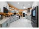 Beautiful kitchen featuring open shelves, stainless appliances, and updated design at 3934 Se 110Th St, Belleview, FL 34420