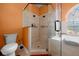Shower area with a large tub, walk-in shower, tiled walls and floor at 3934 Se 110Th St, Belleview, FL 34420