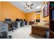 Functional office space featuring multiple workstations, comfortable seating, and convenient laundry access at 3934 Se 110Th St, Belleview, FL 34420