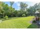 Expansive backyard with lush green lawn at 400 Se 90Th St, Ocala, FL 34480