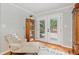 Bright bedroom with doors opening onto the patio and backyard at 400 Se 90Th St, Ocala, FL 34480