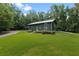 Well-maintained home with mature trees and landscaping at 400 Se 90Th St, Ocala, FL 34480
