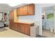 A work bench with drawers and cabinets inside of a garage at 400 Se 90Th St, Ocala, FL 34480