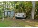 There is a generator and electrical boxes in the backyard at 400 Se 90Th St, Ocala, FL 34480