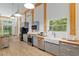 Spacious kitchen with stainless steel appliances and farm sink at 400 Se 90Th St, Ocala, FL 34480