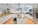 Kitchen featuring an island with steel top and modern stainless steel appliances at 400 Se 90Th St, Ocala, FL 34480