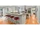 View of the kitchen with the breakfast bar and stainless steel appliances at 400 Se 90Th St, Ocala, FL 34480
