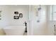 Elegant bathroom with a standalone tub and walk-in shower at 4757 Nw 45Th Ct, Ocala, FL 34482
