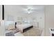 Bright bedroom with a large bed, neutral decor, and ample natural light at 4757 Nw 45Th Ct, Ocala, FL 34482