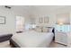 Inviting bedroom with neutral tones, a queen bed, and plenty of natural light at 4757 Nw 45Th Ct, Ocala, FL 34482