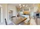 Open dining space with a chandelier and easy access to kitchen and living area at 4757 Nw 45Th Ct, Ocala, FL 34482
