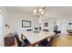 Bright dining space offering a view to the living room and front entry of home at 4757 Nw 45Th Ct, Ocala, FL 34482