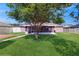 Charming single-story home with well-manicured lawn and mature shade tree at 4757 Nw 45Th Ct, Ocala, FL 34482