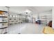 Clean garage with ample shelving for storage and plenty of space for parking vehicles at 4757 Nw 45Th Ct, Ocala, FL 34482
