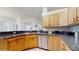 Well-maintained kitchen with stainless steel appliances and light wood cabinetry at 4757 Nw 45Th Ct, Ocala, FL 34482