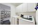 Bright laundry room with appliances and convenient access to the garage at 4757 Nw 45Th Ct, Ocala, FL 34482