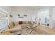 Open-concept living area with stylish decor and seamless flow to other spaces at 4757 Nw 45Th Ct, Ocala, FL 34482