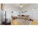Inviting living area featuring a ceiling fan and comfortable sectional sofa at 4757 Nw 45Th Ct, Ocala, FL 34482