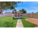 A backyard shed that provides extra storage space and matches the home's aesthetic at 4757 Nw 45Th Ct, Ocala, FL 34482
