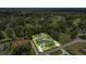 Aerial view of the home, highlighting the location within a lush, green community at 5326 Nw 76Th Ct, Ocala, FL 34482